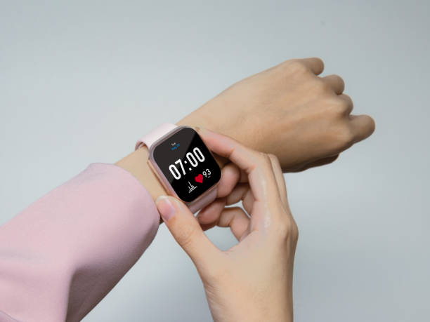 Close up woman using smart watch application. Wearable technology concept