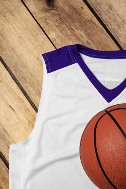 istock Basketball uniform on wooden background top view 2154084249