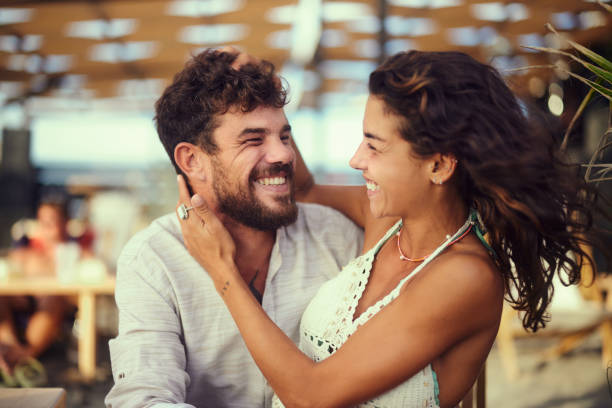 istock Young cheerful couple having fun in summer day. 2154086735