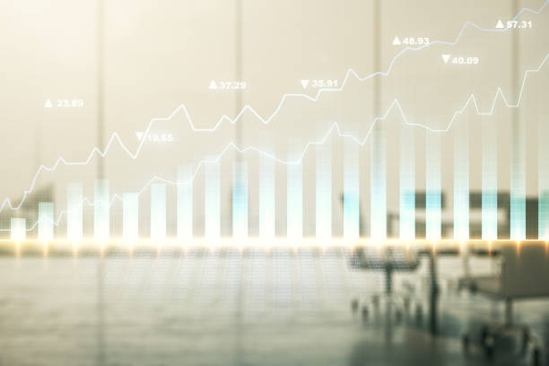 istock Abstract virtual financial graph hologram on a modern conference room background, forex and investment concept. Multiexposure 2154086879