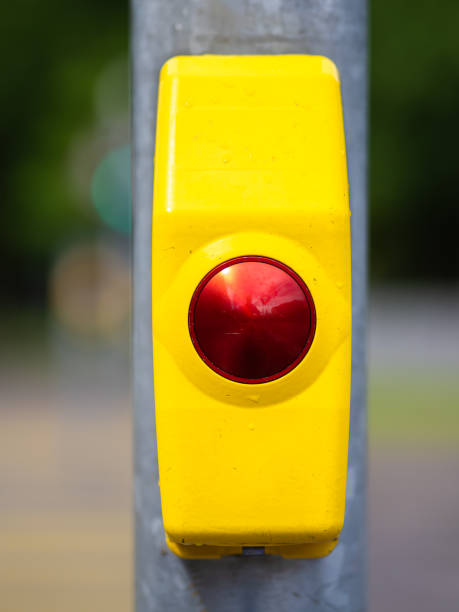 istock Pedestrian crossing button with a red circular center 2154087277