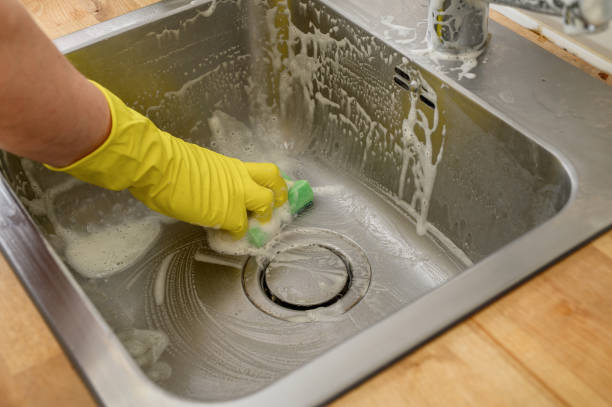 istock Scrub the stainless steel sink closeup 2154090315