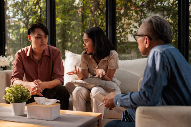 istock Couple talking at the therapy 2154090698