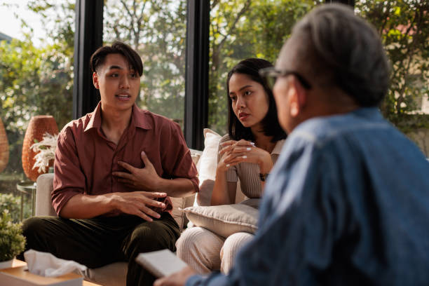 istock Couple talking at the therapy 2154092357