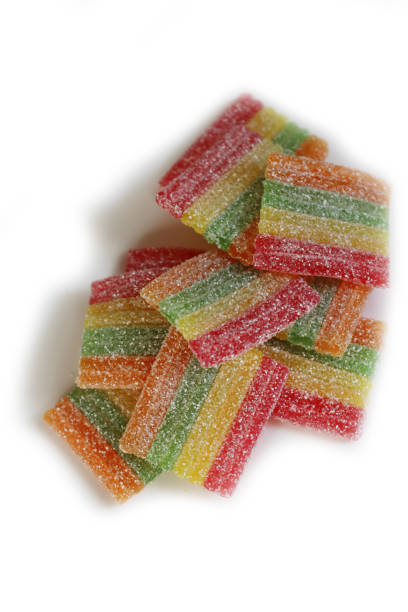 istock Many Rainbow gummy candies on white background 2154092543