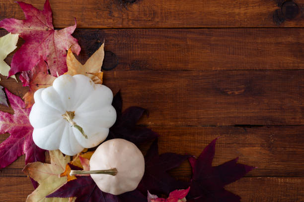 istock Autumn background whit leaves and pumpkin 2154092714