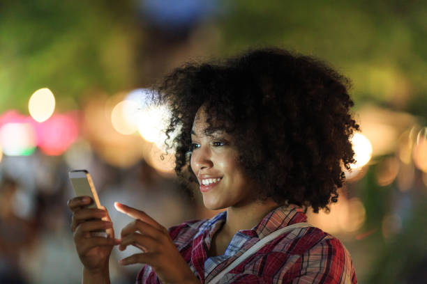 istock Woman texting on phone at night 2154092820