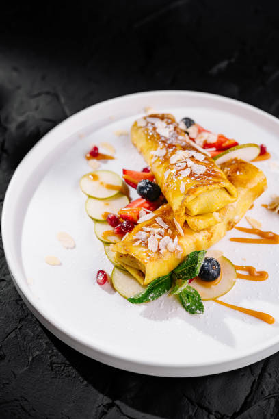 istock Gourmet sweet crepes on elegant white plate 2154095351