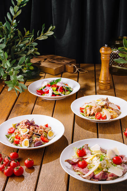 istock Gourmet salad selection on wooden table 2154095673