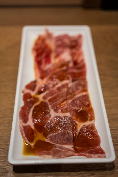 istock Sliced raw beef place on long tray 2154101055