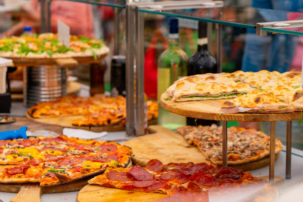 istock pizzeria with fresh pizza for sale 2154101744