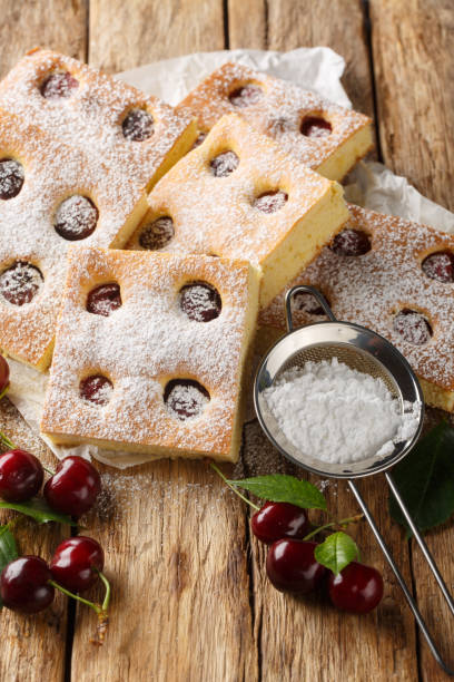 istock Bublanina pie Czech Fruit Sheet Cake closeup on the parchment. Vertical 2154105707