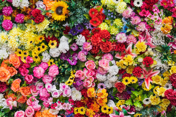 istock Photo background texture, wall of artificial flowers. 2154105788