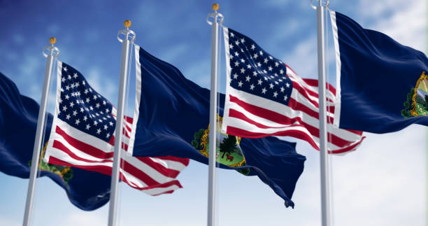 istock Vermont and the american flags waving in the wind 2154107190