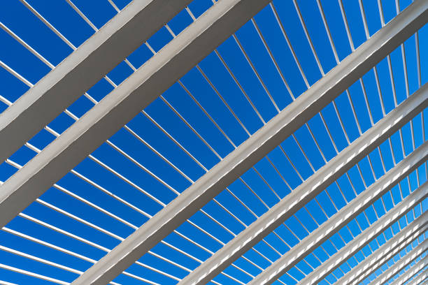 Spain, Palma, Majorca, May 07, 2024 -White metal grid against clear blue sky