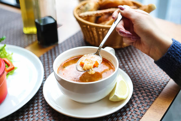 istock Bowl of Tomato Soup With a Silver Spoon 2154113825