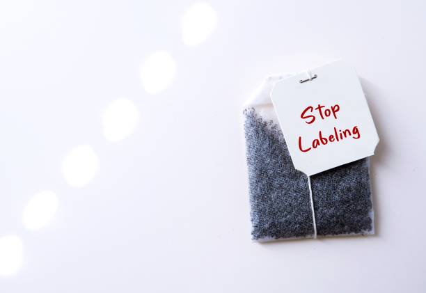 istock Tea bag on white copy space background with text written STOP LABELING , concept of avoid blaming or judging people and better understand them, stop labeling someone else on your problem 2154115626