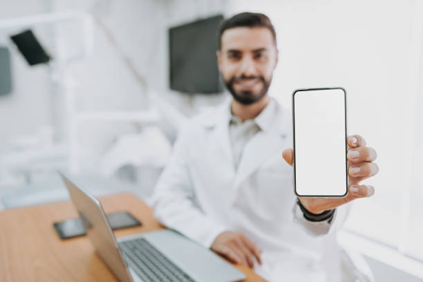 istock doctor showing smartphone 2154116524