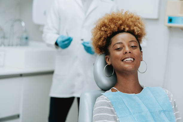 istock woman at the dentist 2154116642