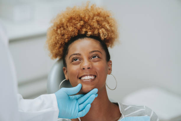 istock woman at the dentist 2154116657