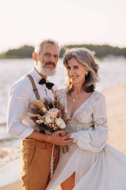 istock Senior newlyweds hug. 2154117012