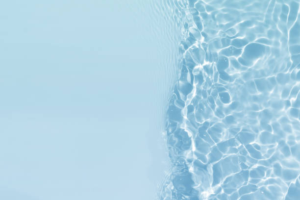 istock abstract blue water wave. natural swirl pattern texture. background photography. 2154117099