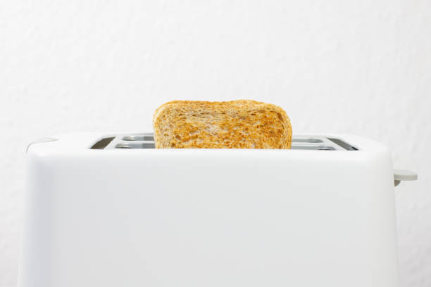 istock toaster with toasted bread inside. breakfast with toast 2154119015
