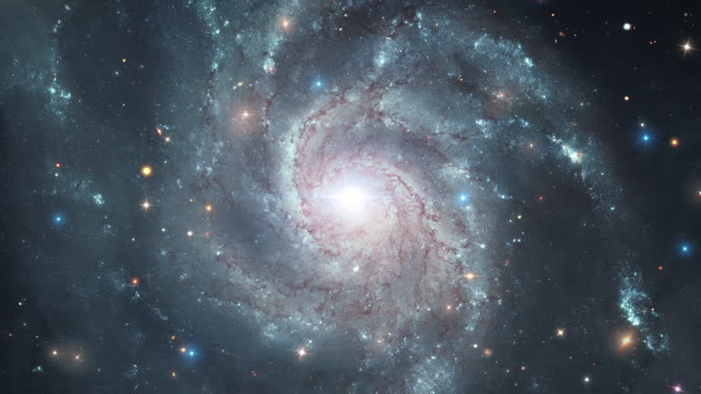 Space exploration travel through outer space towards Messier 101 galaxy. Animation of flying through glowing nebulae, 4K flying through the clouds and star field in deep space.Elements of this image furnished by NASA.