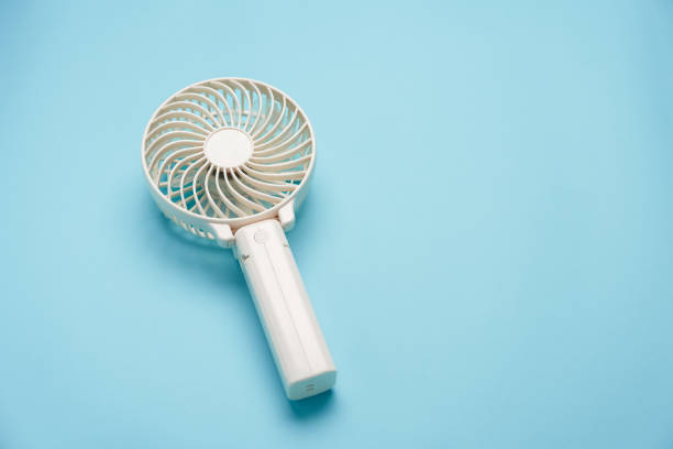 istock Portable electric fan on color background 2154120879
