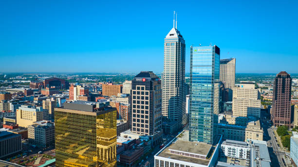Indianapolis, United States – July 08, 2025: Wide aerial view of Gainbridge Fieldhouse surrounded by the Indianapolis skyline on a summer day