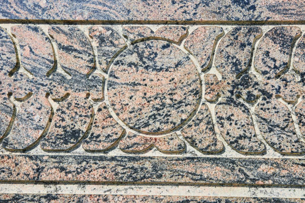 Close-up of intricate stone mosaic pavement in downtown Indianapolis plaza, showcasing skilled craftsmanship and geometric design, 2023