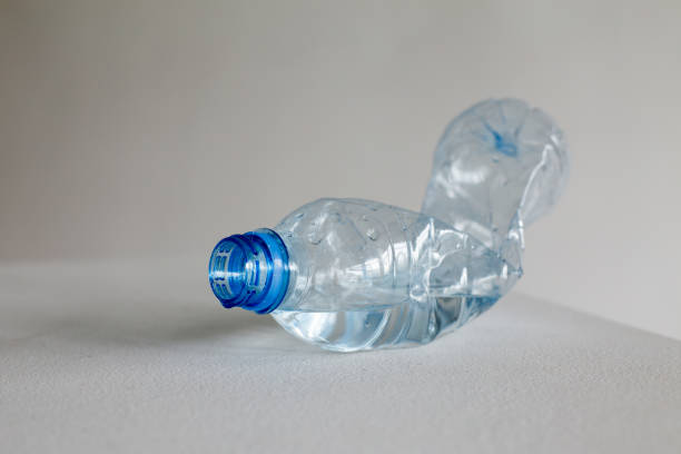 istock water bottle, rumpled, glows like crystal or ice 2154126262