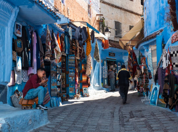 Chefchaouen, Morocco,  May 7, 2024: This photo was taken in the old town of Chefchaouen. The doorways, stairs and walls of most houses here are painted in the most brilliant sky blue. As a small city in an Islamic country, Chefchaouen is filled with  Arabic customs.