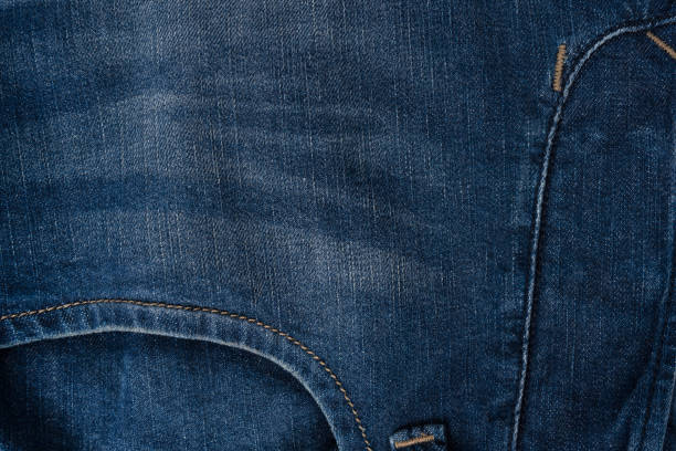 Blue jeans denim texture as a background. Top view.