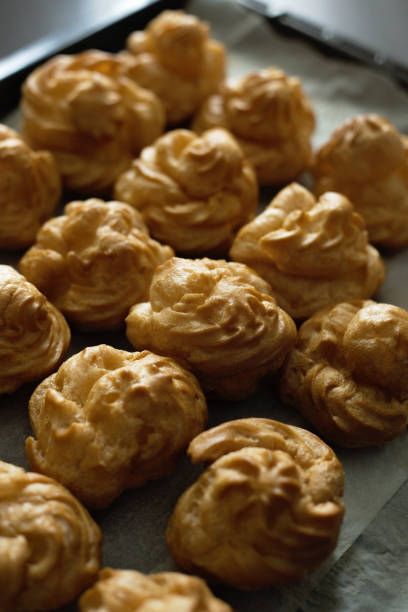 istock Choux pastry, choux pastries with delicate cream inside 2154130344