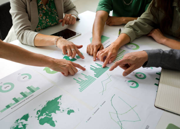Business team discussing overt charts