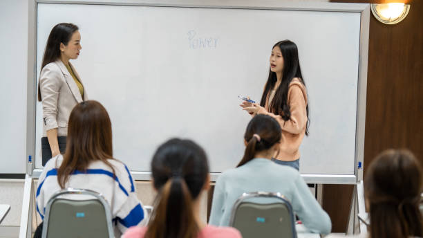 istock A group of women are sitting in a classroom 2154135213