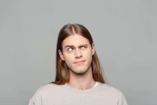 istock Headshot of surprised young man 2154135560