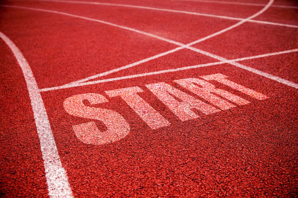istock Starting line Sign At Running Track background 2154135609