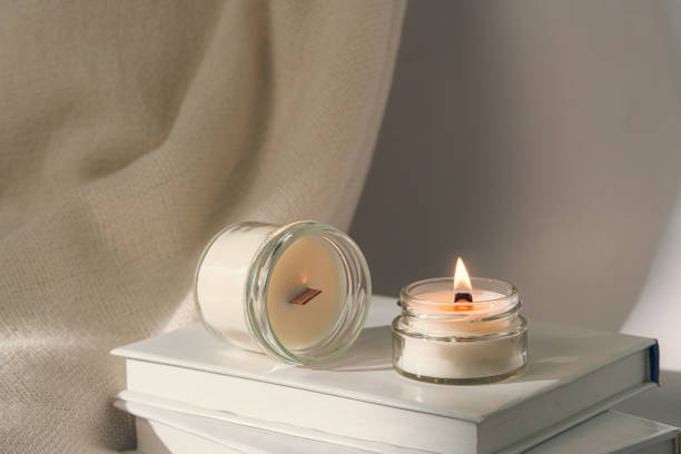 istock Aromatic candle in glass jar close up 2154138388