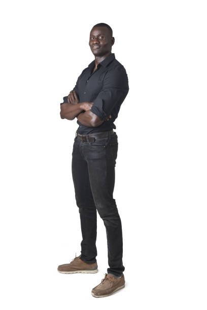 Studio portrait of a young businessman standing against a white background