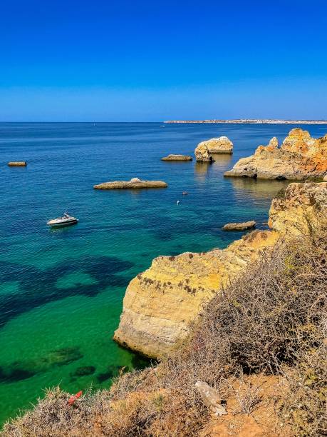 istock Algarve coast, blue water, beaches, rocks, Portugal 2154147574