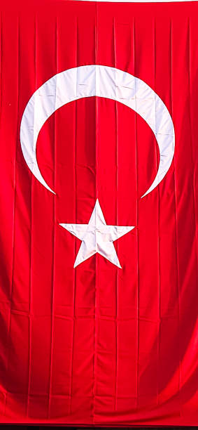 istock A huge Turkish flag is hanged on the wall of a building 2154147872