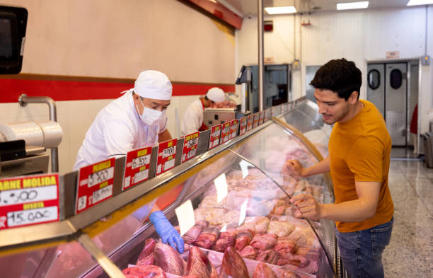 istock Man buying meat at the butchery 2154155013