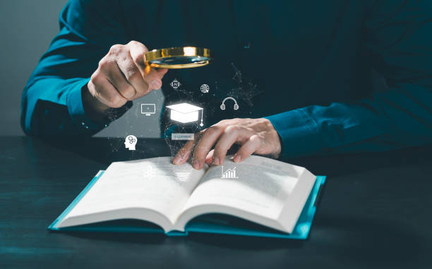 istock Graduation hat with light bulb on books and learning icons in classroom e-learning concept Education and e-learning technology, business education to increase personal skills and knowledge. 2154155101