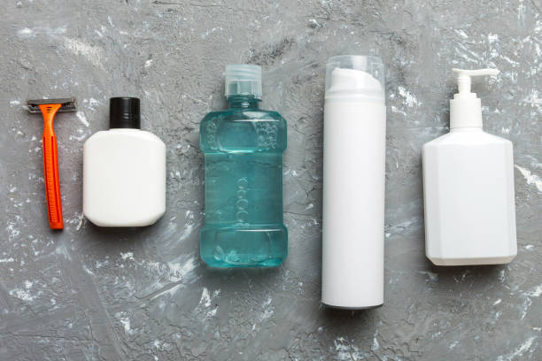 istock Mockup for bathing products top view flat lay, spa razor, toothpaste, soap, gel and other various accessories. Cosmetics for skin health. Bath Mockup for your logo 2154155301