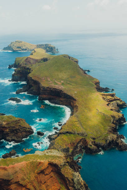 istock Aerial View of Majestic Greed Cliffs Surrounded by Ocean 2154156479