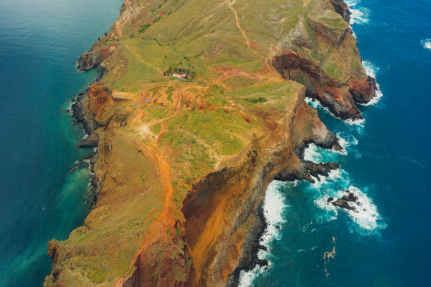 istock Aerial View of Majestic Greed Cliffs Surrounded by Ocean 2154156481