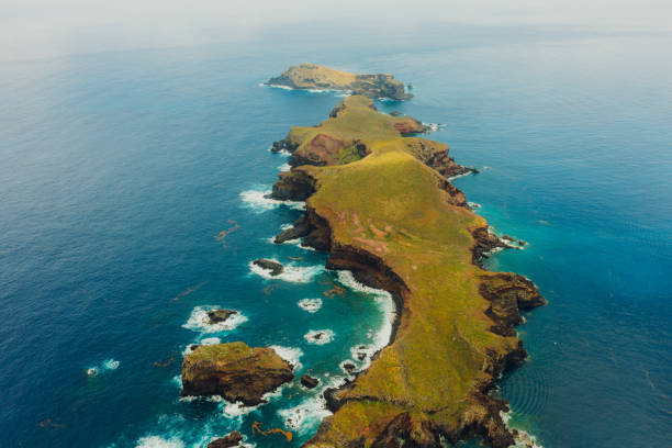 istock Aerial View of Majestic Greed Cliffs Surrounded by Ocean 2154157296