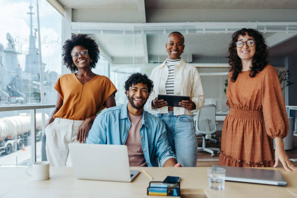 istock Successful colleagues in a modern office working together 2154161272